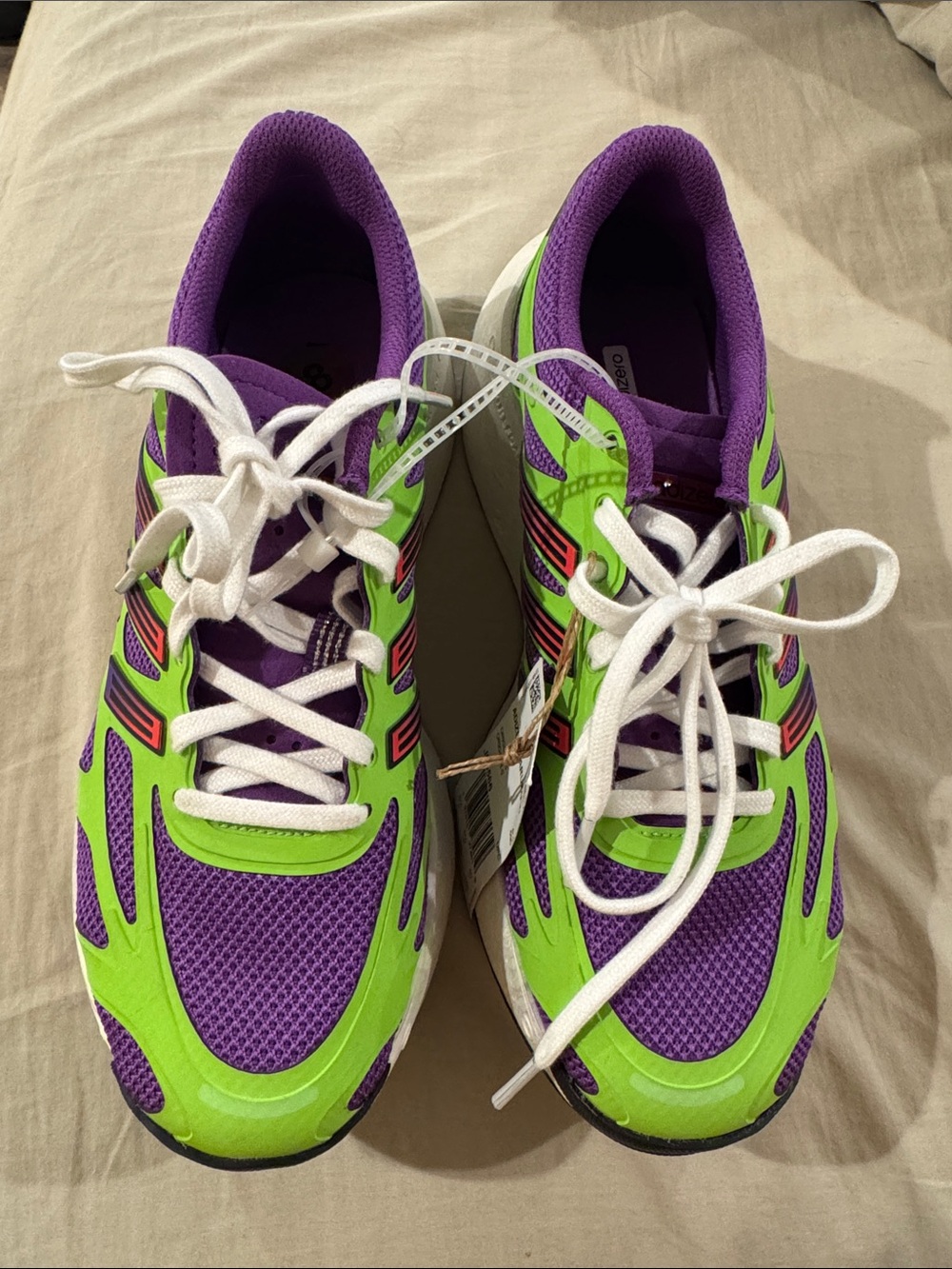 Adidas Adizero Aruku NEW
Purple & Neon Green
Performance Running Shoes